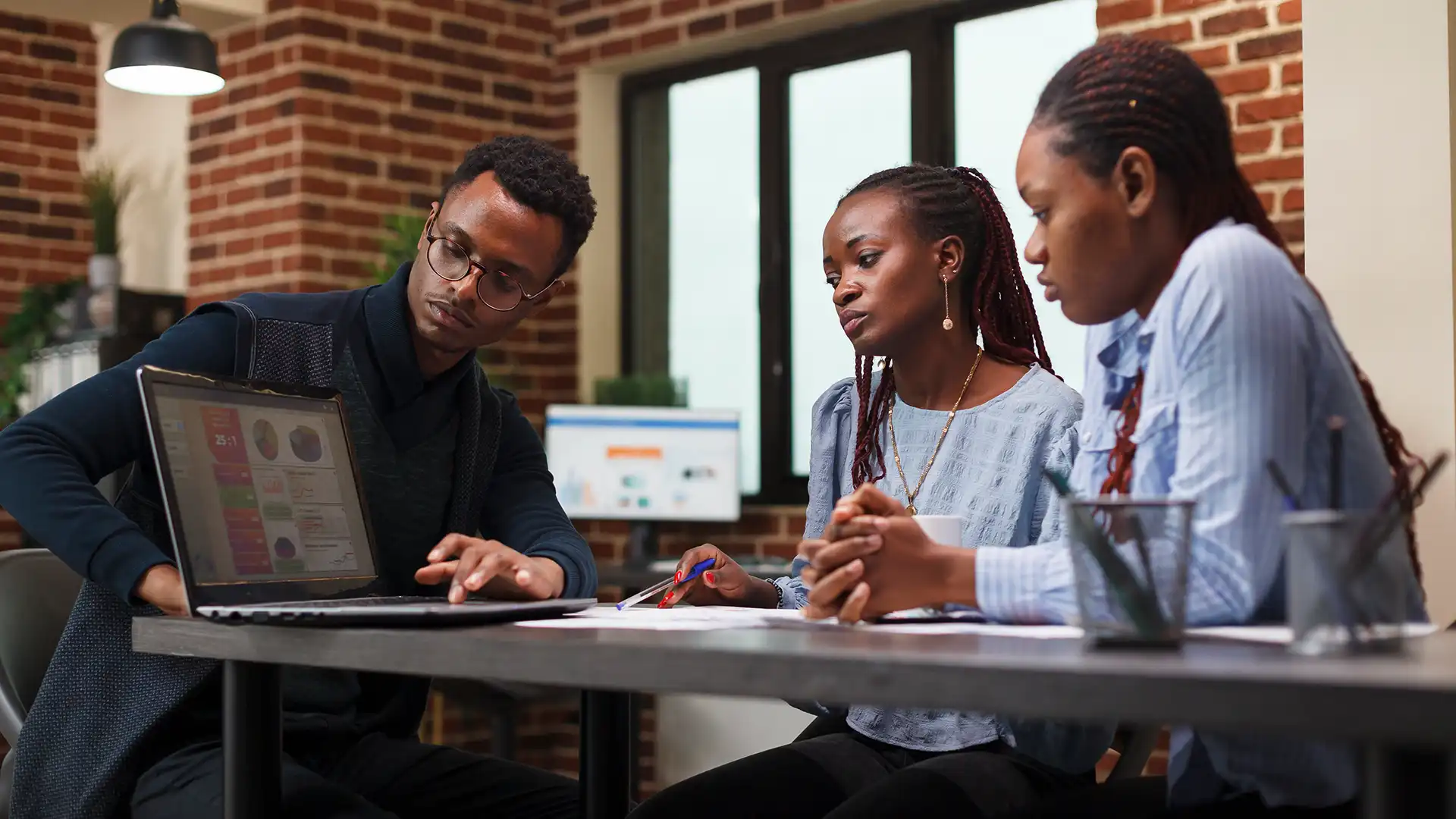 Colleagues managing a shared brand